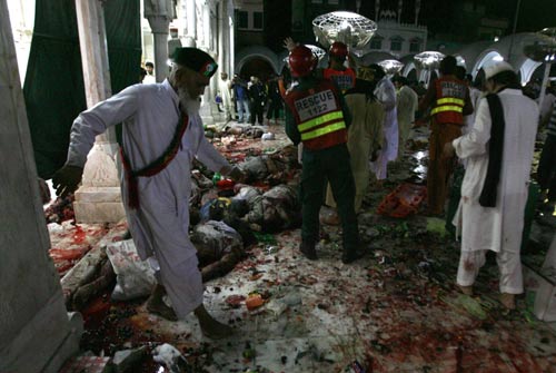 Pakistanis blame US after shrine attack kills 42