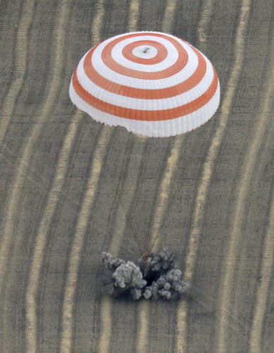 Russian-US space crew heads for Earth