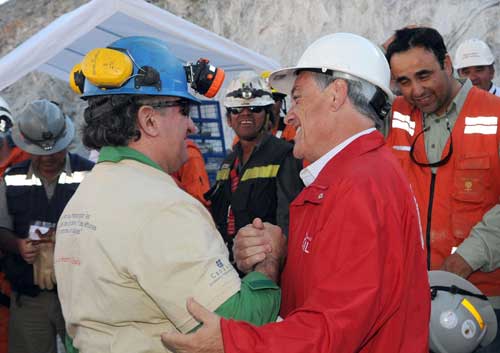 28 miners free as Chile rescue goes off flawlessly