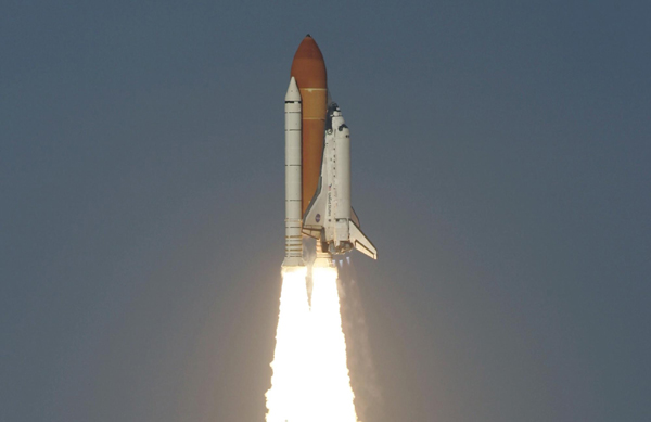 Shuttle Discovery lifts off for last space flight