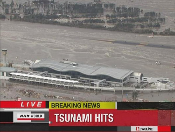 Tsunami hits, one reported dead after Japan quake