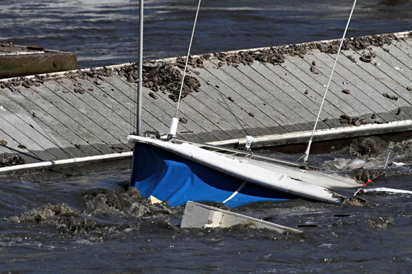 Tsunami waves damage harbors on US West Coast, one missing