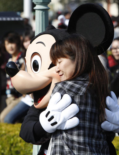 Japan steps ordinary life as Disneyland reopens