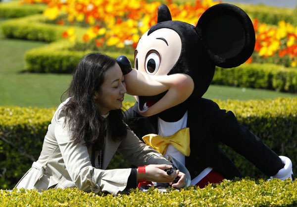 Japan steps ordinary life as Disneyland reopens