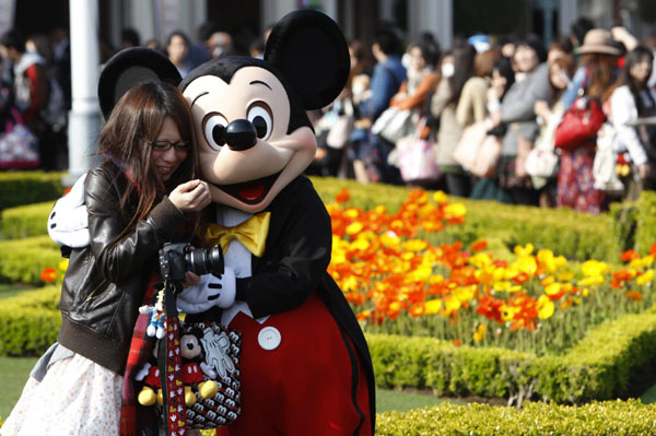 Japan steps ordinary life as Disneyland reopens