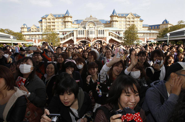 Japan steps ordinary life as Disneyland reopens