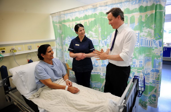 Cameron says health reforms must go ahead