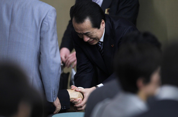 Whoa...Japan PM Kan survives no-confidence vote