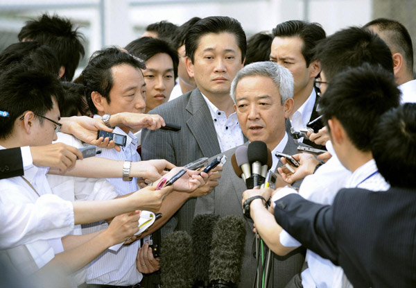 Japan reconstruction minister resigns