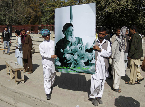 Afghans mourn ex-president on World Peace Day