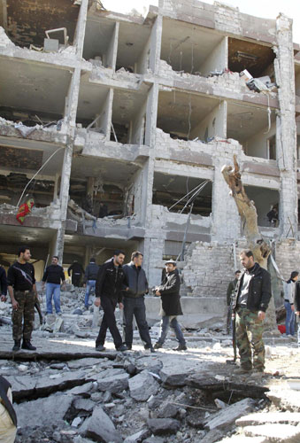 Blasts in Syrian capital kill 27