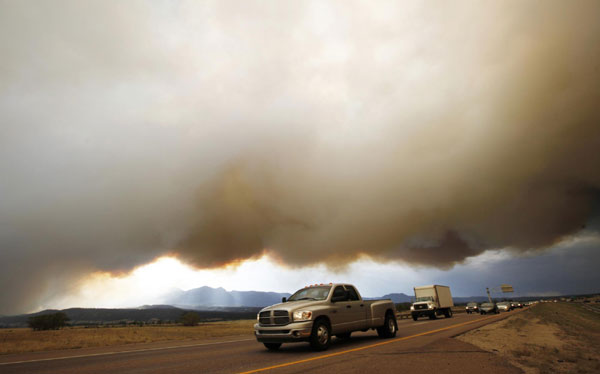 Colorado wildfire rages; Obama plans visit
