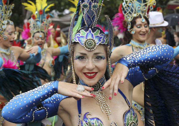 Performers dance at the Notting Hill Carnival