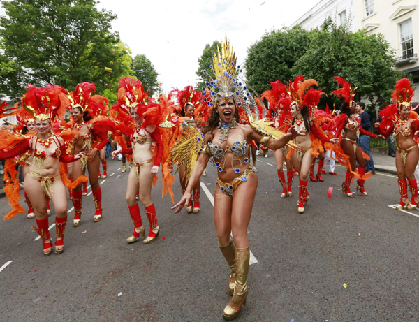 Performers dance at the Notting Hill Carnival