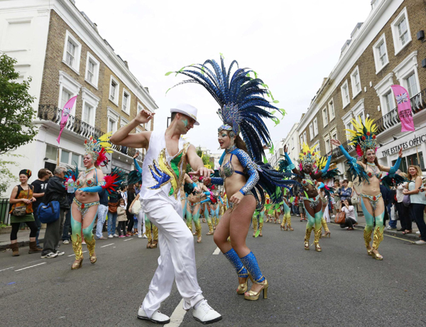 Performers dance at the Notting Hill Carnival