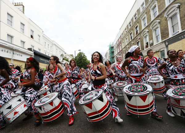 Performers dance at the Notting Hill Carnival