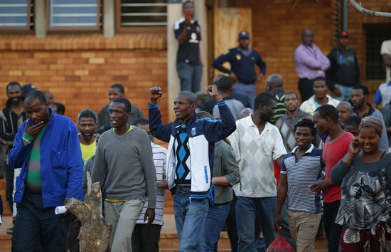 S Africa releases first group of detained miners