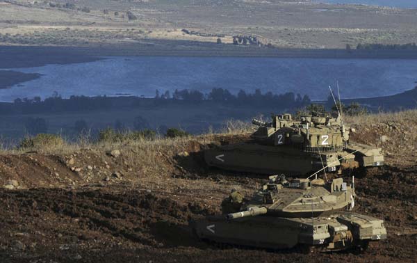 Israel fires back after Syria hits