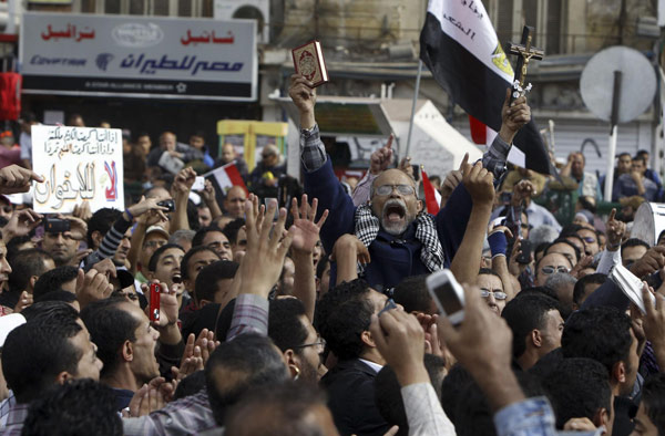 Protests after Mursi assumes powers in Egypt