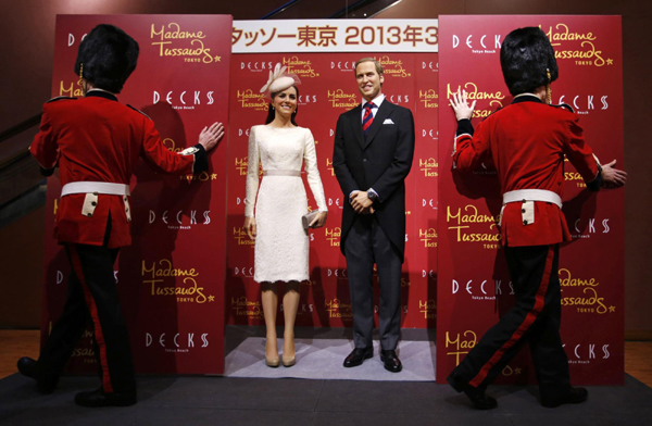 Wax figures of UK Prince William and Catherine