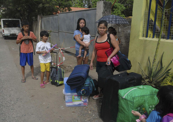 Typhoon Bopha kills 129 in the Philippines