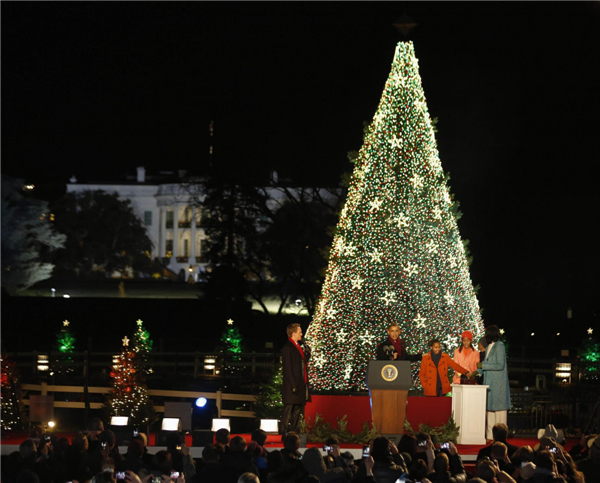 Obama lights up National Christmas tree