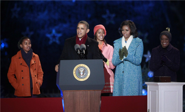 Obama lights up National Christmas tree