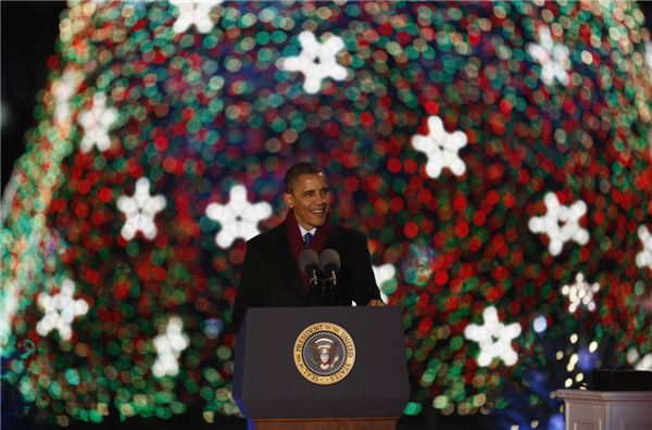 Obama lights up National Christmas tree