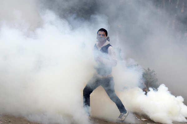 Morsi declares emergency after clashes kill dozens