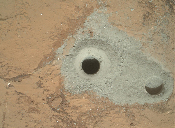 NASA's robotic rover Curiosity drills into Martian rock