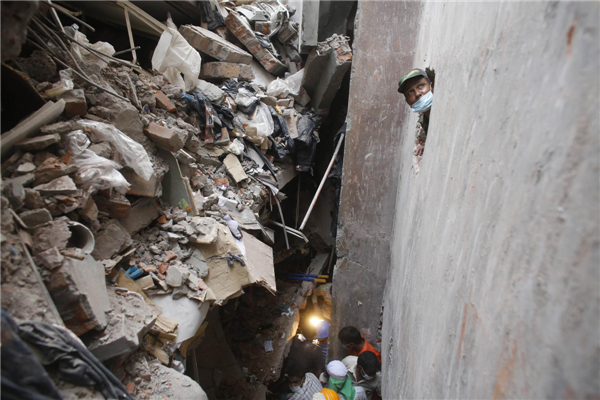 2 arrested as Dhaka building collapse toll reaches 332