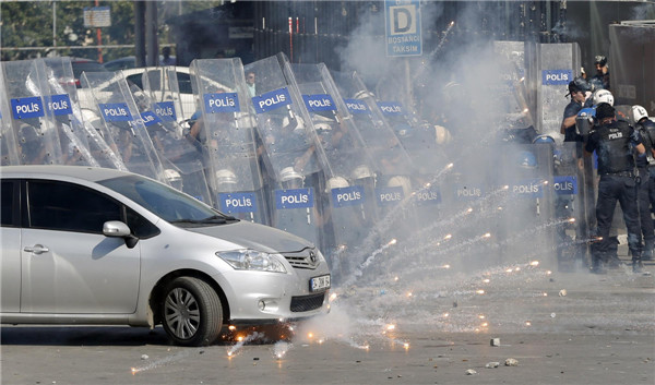 Thousands take to streets in Turkey, clash with police