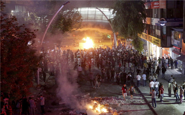 Thousands take to streets in Turkey, clash with police