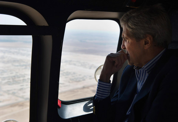 Syrian refugees demand help from Kerry at camp