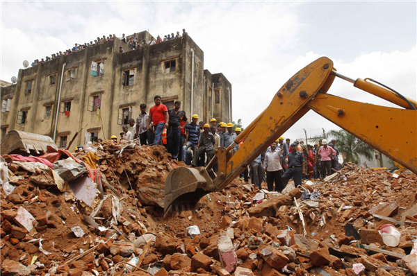 12 killed in twin building collapse in India