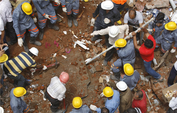 12 killed in twin building collapse in India