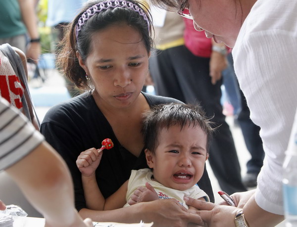 Typhoon Haiyan death toll climbs to 3,982
