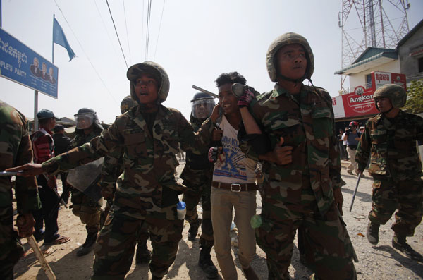 Cambodian police fire on strikers, killing 2