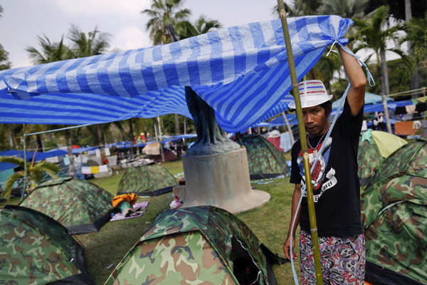 Thai protesters to scale back Bangkok gatherings