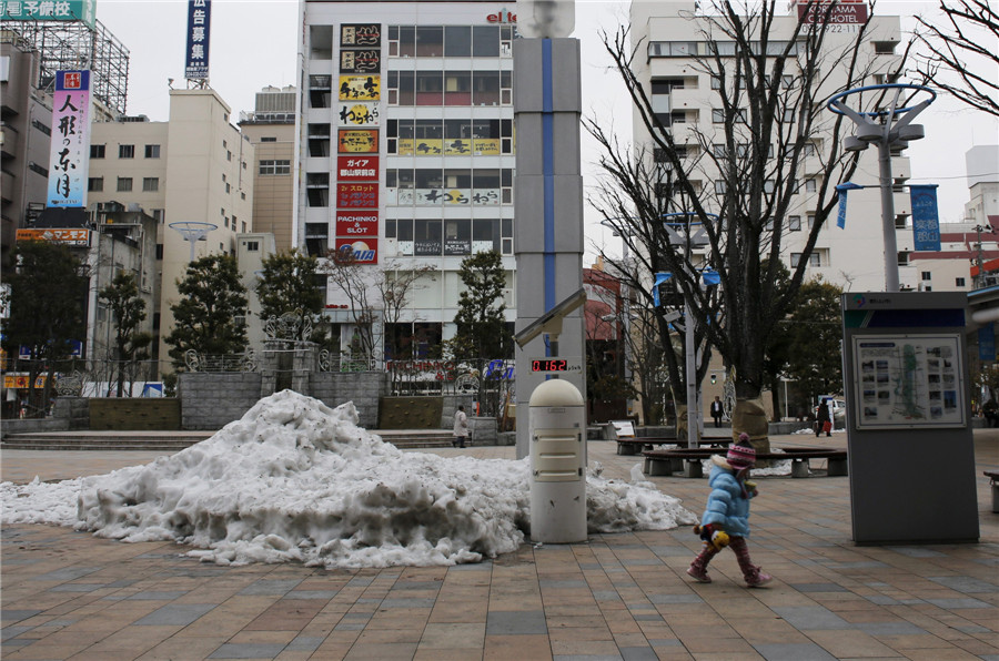 Children of Japan's Fukushima battle invisible enemy