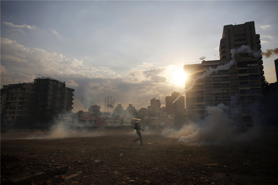 Protesters take part in clashes in Venezuela