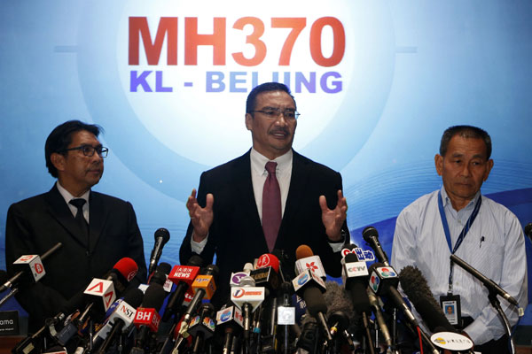 Malaysian officials hold news conference on missing plane