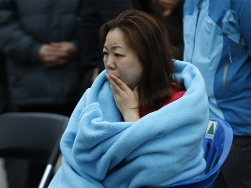 Death toll surges to 56 as divers enter sunken S.Korean ferry