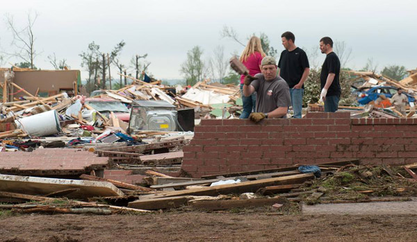 US storm system kills 19, tornado hits Mississippi city