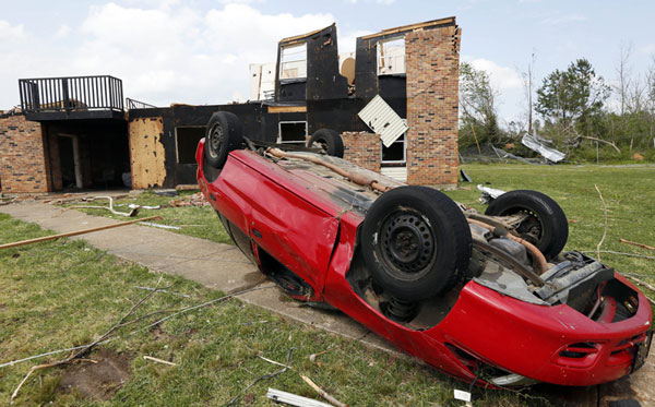 Death toll rises as storms tear through south US