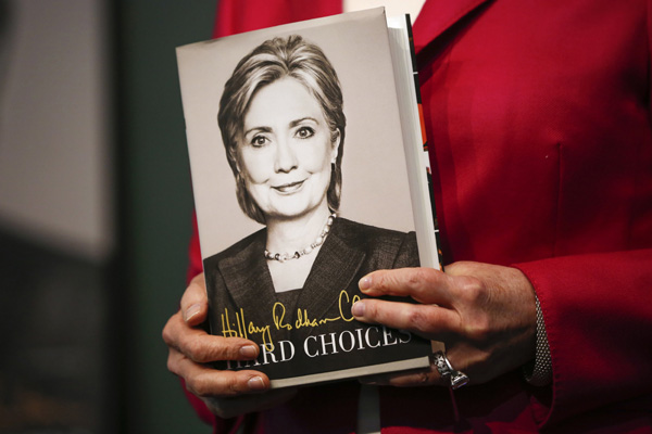 Clinton uses book tour to test waters for White House run