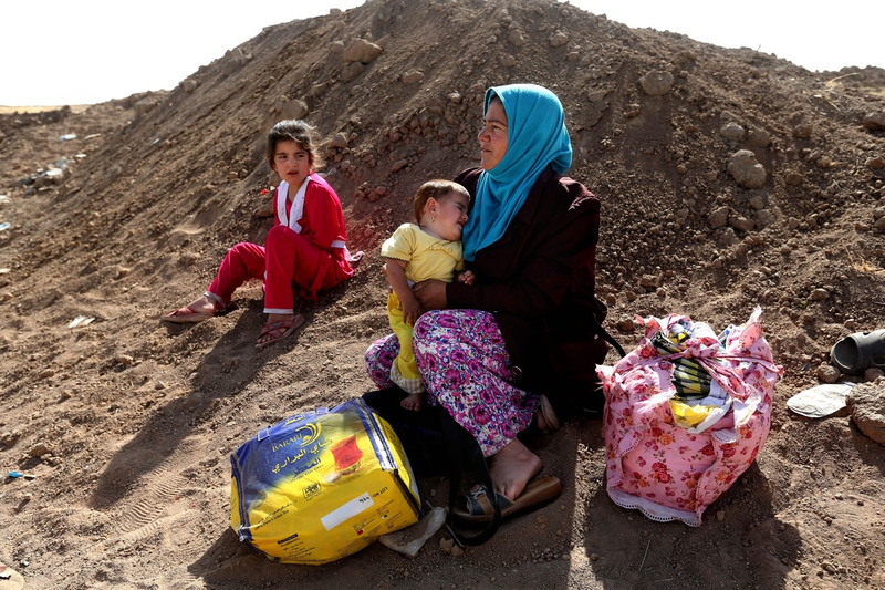 Northern Iraqis flee home, avoiding Sunni millitans