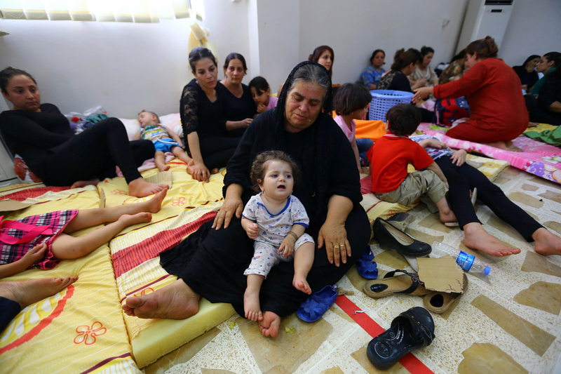 Northern Iraqis flee home, avoiding Sunni millitans