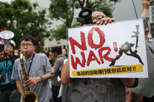 Korean protest against Japan to lift ban on collective self-defense right