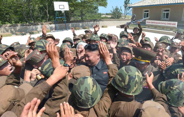DPRK leader Kim guides live shell firing exercise